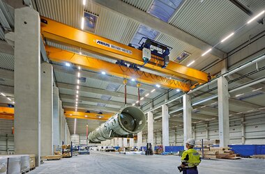 Zweiträgerlaufkrane mit verfahrbaren Hubwerken für Tandembetrieb